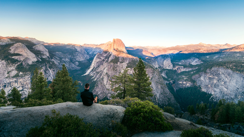 man enjoys Glacier Point view