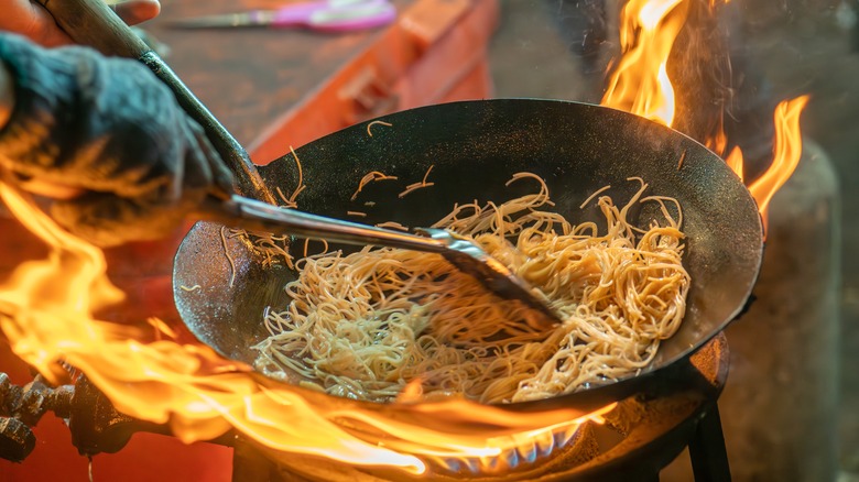 Street vendor cooking noodles