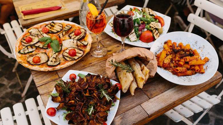 Outdoor table with Italian dishes