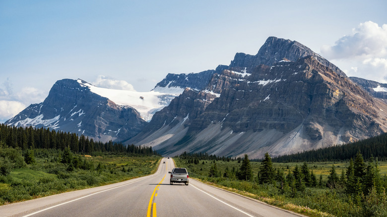 road trip in Alberta Canada with mountains and blue skies