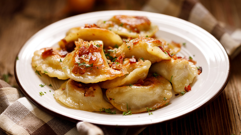 bowl of pierogies with bacon