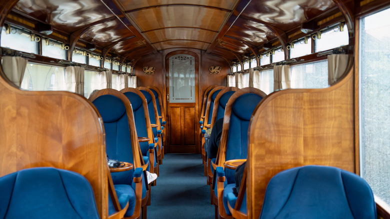 British Pullman interior with wood and blue seats