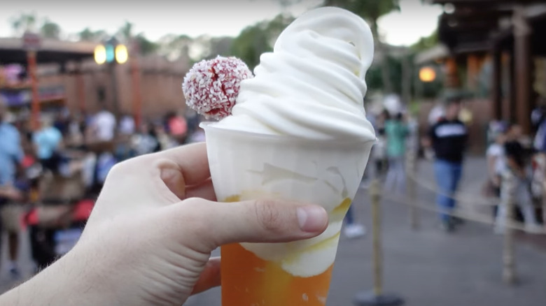 Hand holding a dole whip float