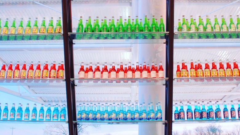 rows of colored soda bottles