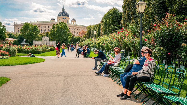 people sitting in Volksgarten, Austria