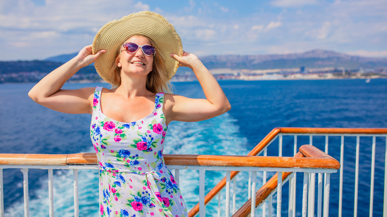 A woman enjoying herself on a cruise