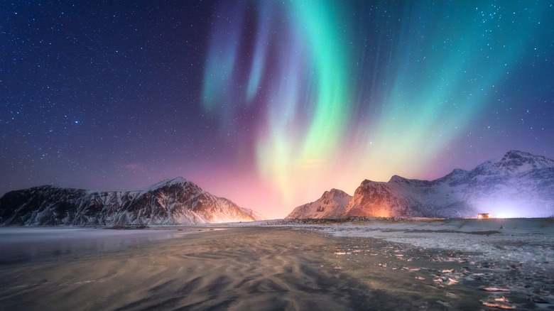 Aurora borealis above mountains