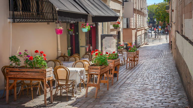 An outdoor cafe on a street in Montmartre.