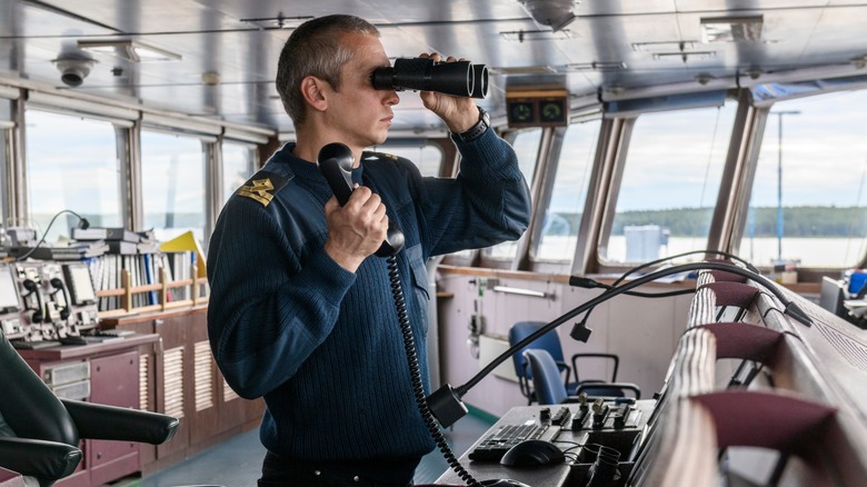 Officer navigating on a cruise ship