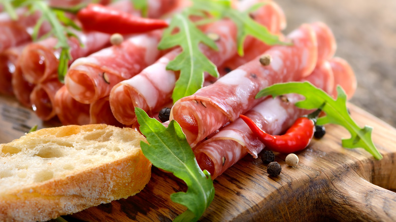 bread slice next to salami