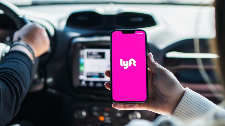 Lyft on phone inside car