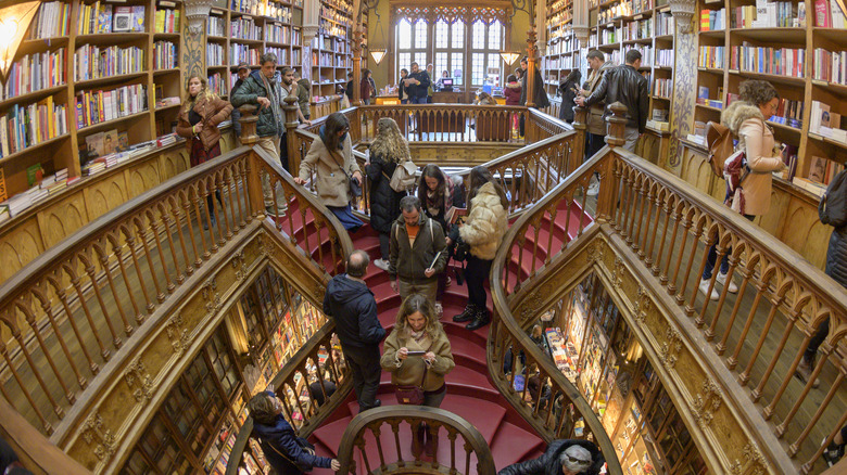 Tourists inside Livraria Lello