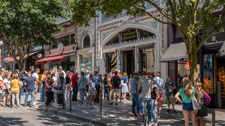 People outside Livraria Lello