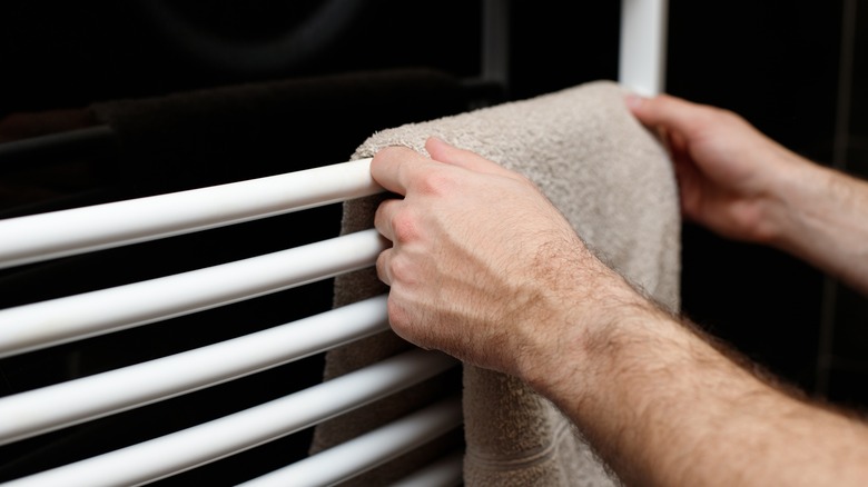 Hanging towel on heated rack