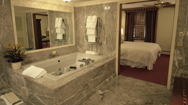 Luxury guestroom featuring Kohler bath fixtures