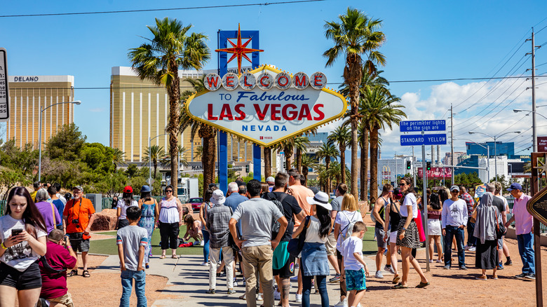 Crowd gathers around Las Vegas sign