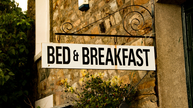 Bed & breakfast sign hanging on wall