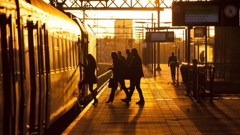 People boarding train