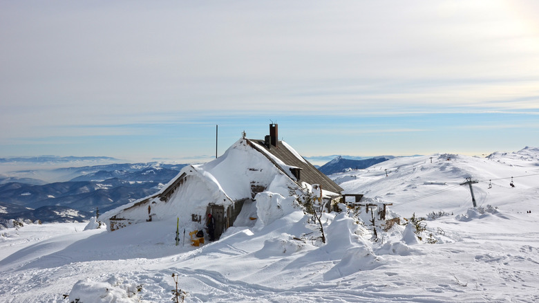 Snow covered cottage at Jahorina