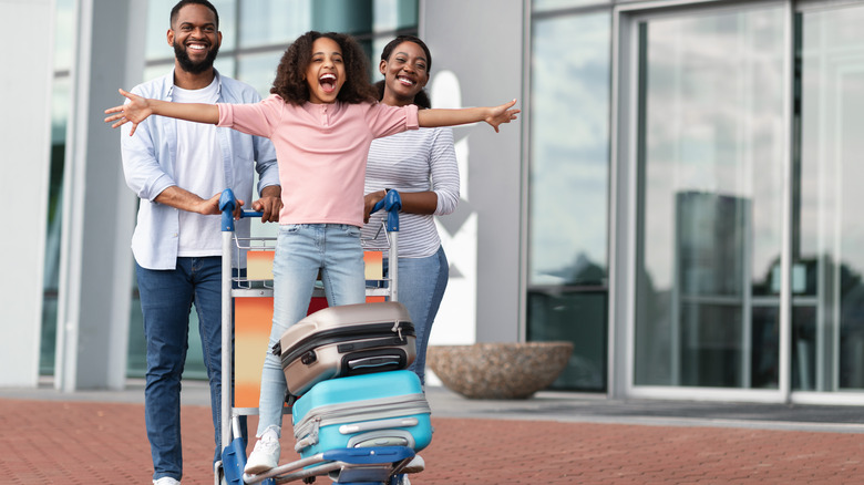 family with luggage