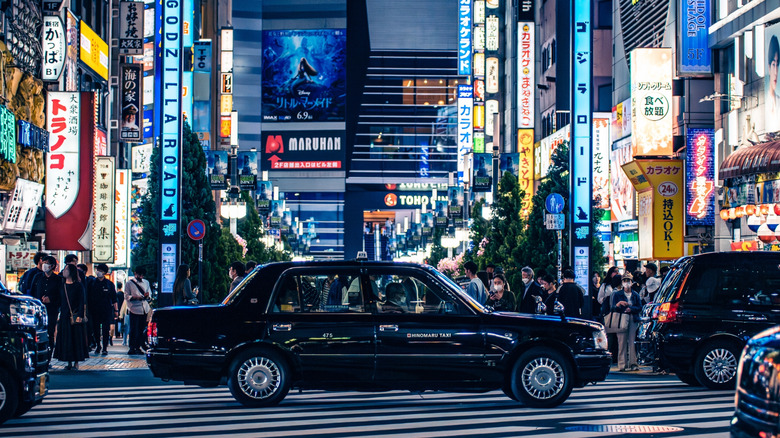 Taxi waiting on Tokyo street at night