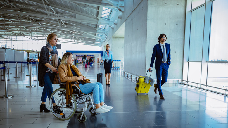 traveler in wheelchair at airport