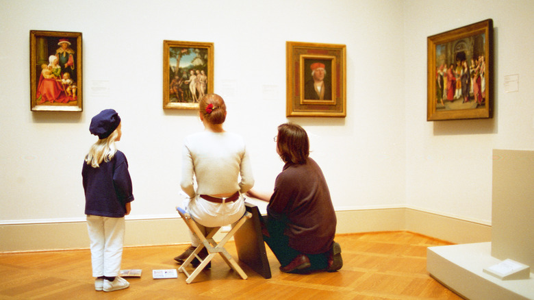 People viewing art at museum