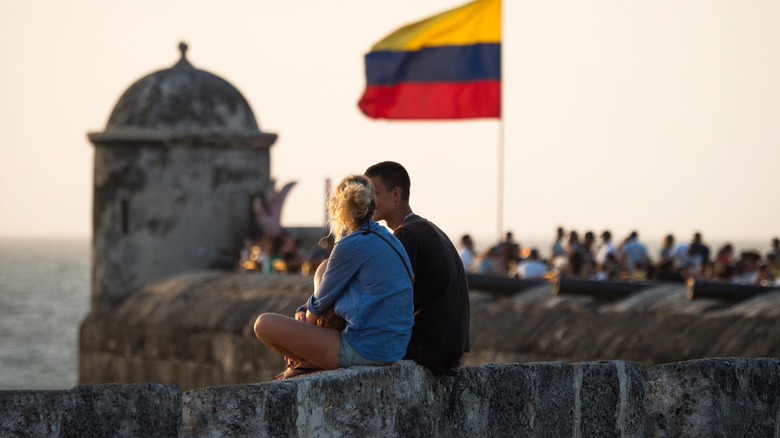 People sitting on Cartagena's walls