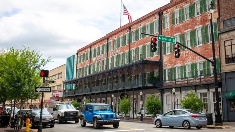 the Marshall House with traffic in front of it