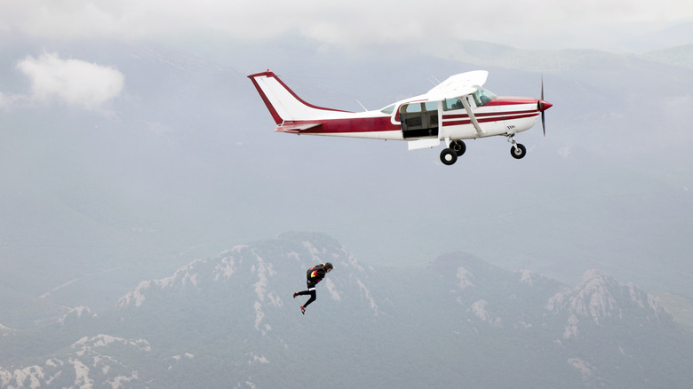 man jumps from plane