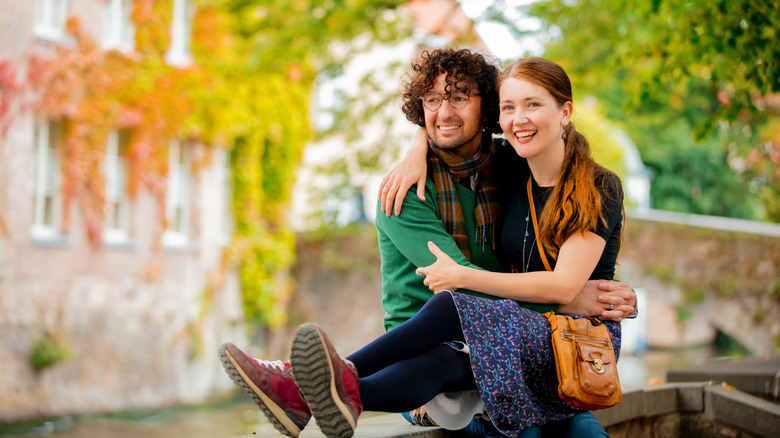 Smiling couple in Bruges