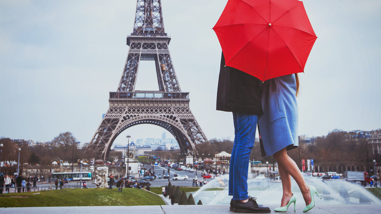 Couple kissing  in Paris