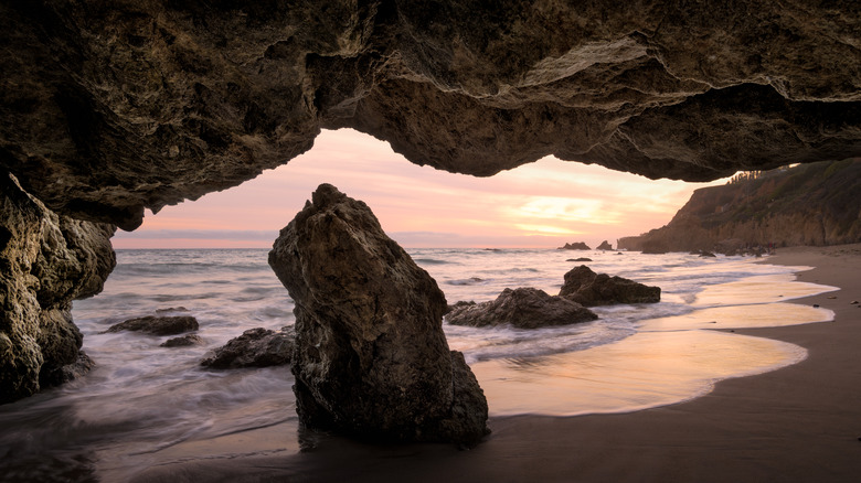 A sea cave at sunset