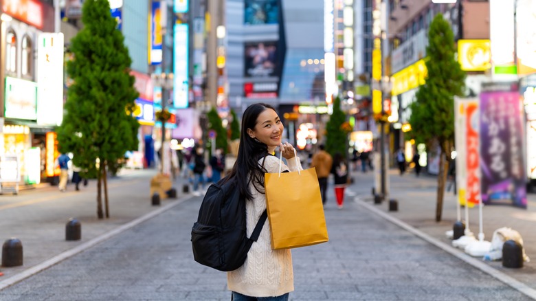 woman holding bag in Tokyo