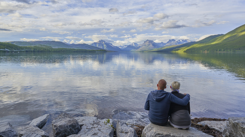 Couple overlooking Glacier National Park