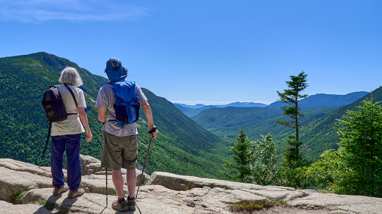 hikers looking at mountain views