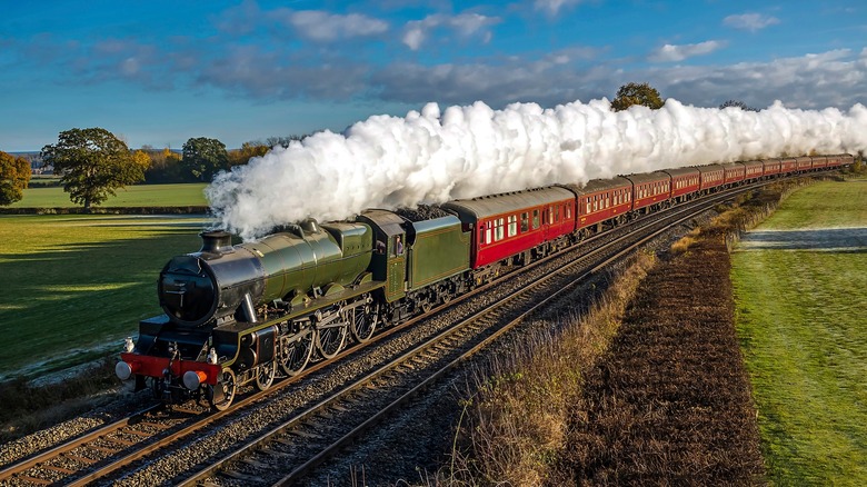 Vintage steam train on railway