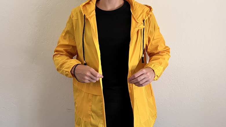woman wearing yellow raincoat