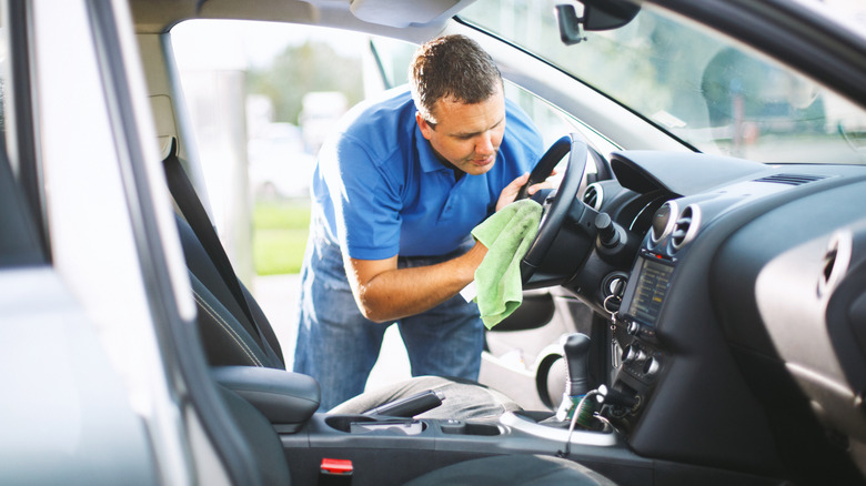 Man detailing a vehicle