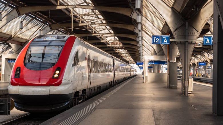 train at platform in modern station