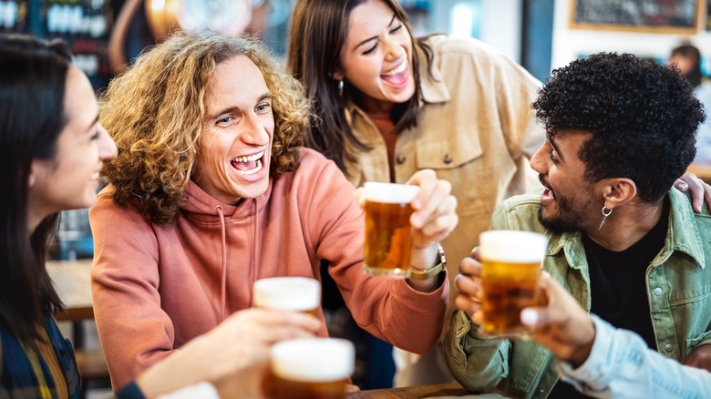 Group of travelers enjoying beers