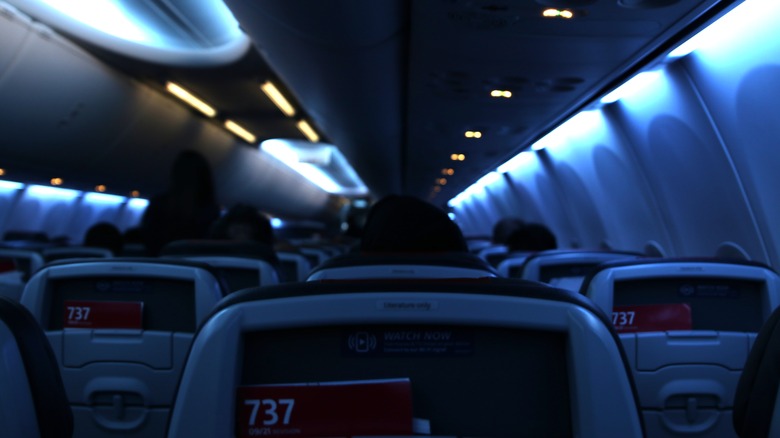 Dimmed lights inside airplane