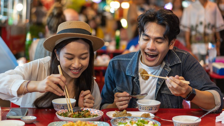 Young couple sharing a meal