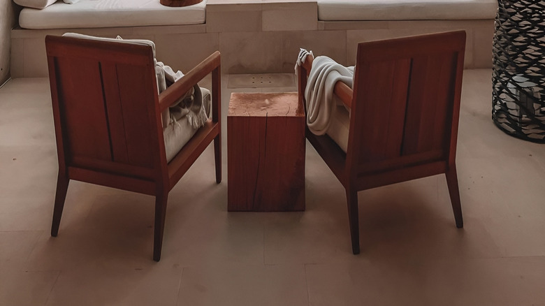 Chairs overlooking the canyon at sunset, at Amangiri resort.