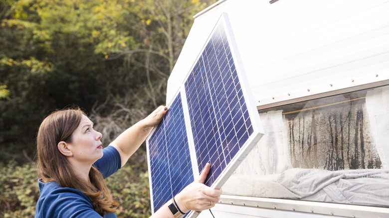 Woman holding UV panels