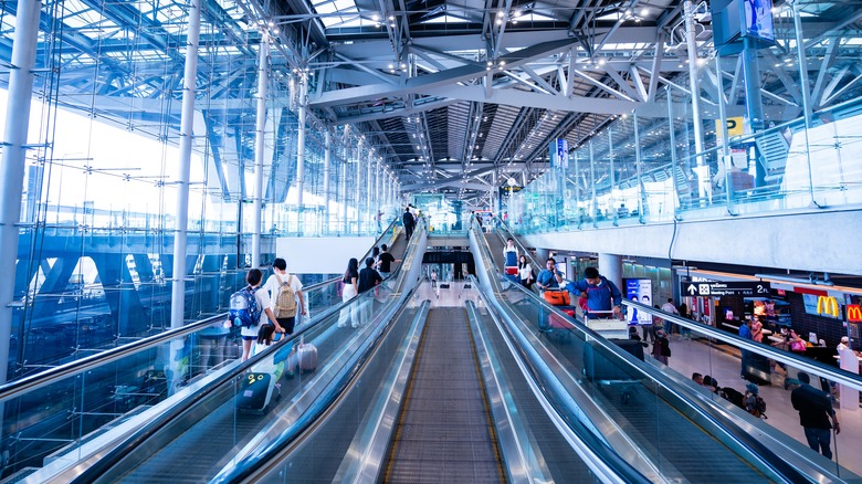 people walking in modern airport
