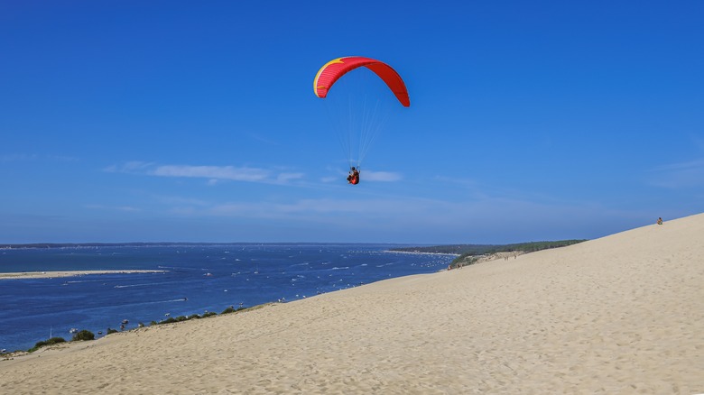 A parasailor over Dune du Pilat in Arcachon, France