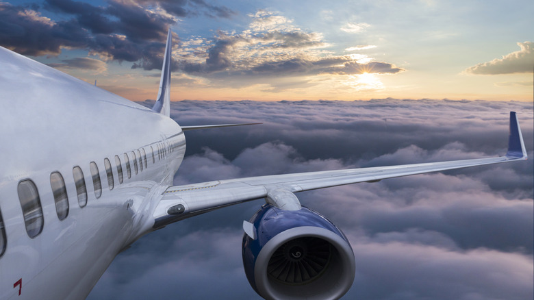 Plane flying through clouds