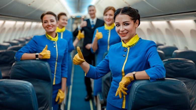 Flight crew giving thumbs up
