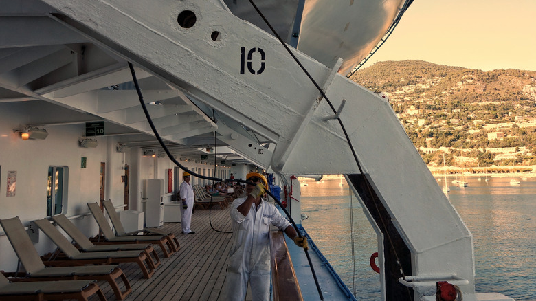 Cruise workers loading lifeboat tenders